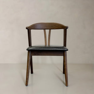 HomeRoots Set of Two Mid-Century Modern Black Faux Leather Side Chairs with Walnut Wood Legs for Stylish Living 716262
