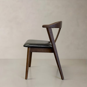 HomeRoots Set of Two Mid-Century Modern Black Faux Leather Side Chairs with Walnut Wood Legs for Stylish Living 716262