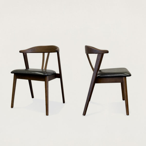 HomeRoots Set of Two Mid-Century Modern Black Faux Leather Side Chairs with Walnut Wood Legs for Stylish Living 716262