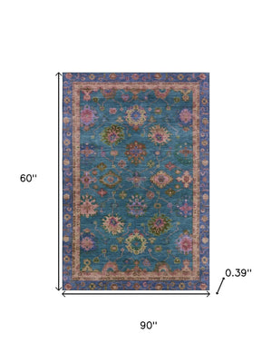HomeRoots 8' Teal and Blush Oriental Washable Round Rug - Durable, UV-Protected, Perfect for Busy Homes! 716440