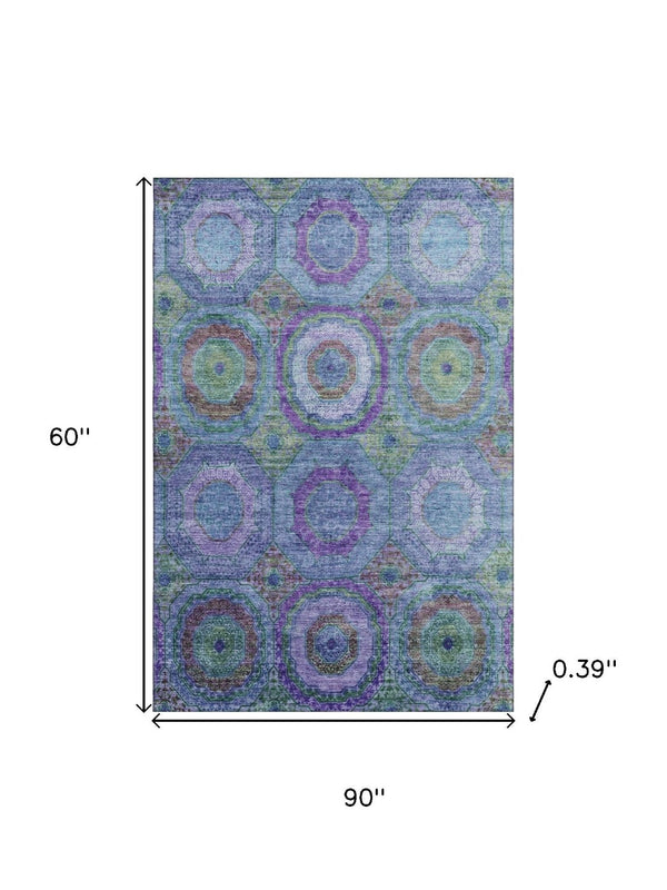 HomeRoots 8' Blue and Purple Geometric Round Rug - Washable, UV-Protected, Non-Slip, Family-Friendly Style! 716482