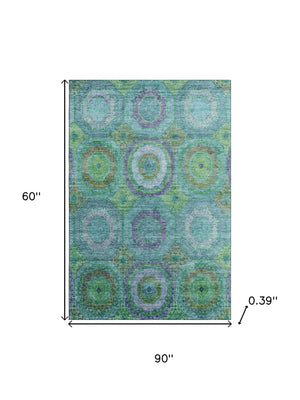 HomeRoots 8' Vibrant Teal and Lime Green Geometric Washable Round Rug with UV Protection for Active Homes 716512