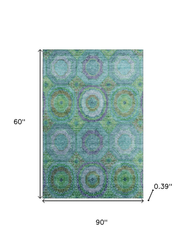 HomeRoots 8' Vibrant Teal and Lime Green Geometric Washable Round Rug with UV Protection for Active Homes 716512