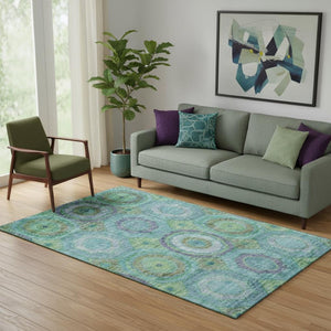 HomeRoots 8' Vibrant Teal and Lime Green Geometric Washable Round Rug with UV Protection for Active Homes 716512