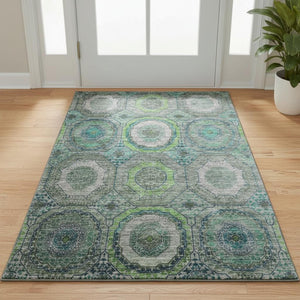 HomeRoots 5' X 8' Vibrant Teal and Lime Geometric Washable Area Rug - Durable, UV-Protected & Stylish Design 716523