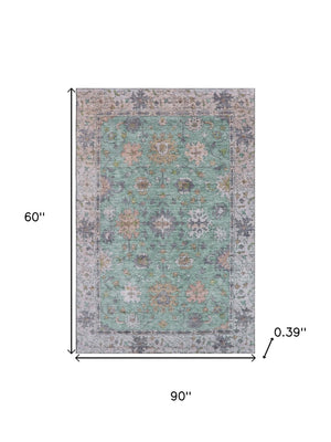 HomeRoots 8' Mint Green & Peach Oriental Washable Round Rug – Stain Resistant, UV Protected, Machine Washable 716572