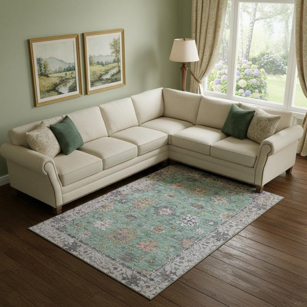 HomeRoots 9' X 12' Mint Green & Peach Oriental Area Rug - Washable, UV Protected, Stain Resistant for Homes 716574