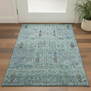 HomeRoots 5' X 8' Teal and Pale Aqua Washable Area Rug with Floral Vines – UV Protection for Busy Homes! 716619