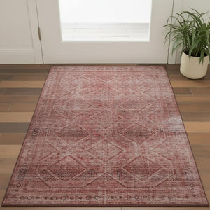HomeRoots 5' X 8' Pink and Mauve Geometric Area Rug - Washable, UV-Protected, Stylish & Family-Friendly Décor 716757