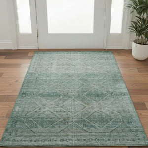 HomeRoots 5' X 8' Teal and Pale Aqua Geometric Area Rug - Washable, UV Protected, Stain Resistant & Non-Slip! 716763