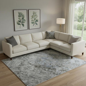 HomeRoots 9' X 12' Blue & Taupe Abstract Washable Area Rug - UV Protected, Durable & Low-Maintenance Design 716778