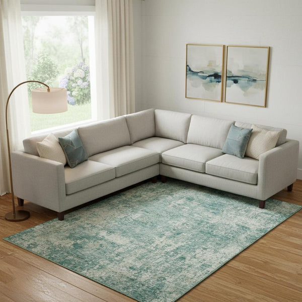 HomeRoots 9' X 12' Teal and Beige Abstract Area Rug - Washable, UV Protected, Stain Resistant for Modern Homes 716796
