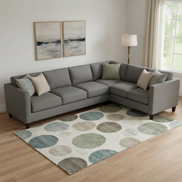 HomeRoots 9' X 12' Ivory and Teal Geometric Area Rug - Washable, UV-Protected, Ideal for Family Spaces! 716826