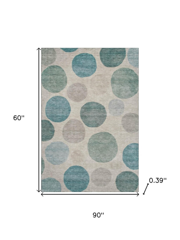HomeRoots 8' Teal and Ivory Geometric Washable Round Rug - Stylish, Durable, UV-Protected for Busy Homes 716842