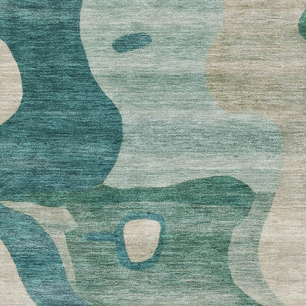 HomeRoots 8' Teal and Ivory Abstract Washable Round Rug - Stylish, Durable, UV Protected for Busy Homes! 716860