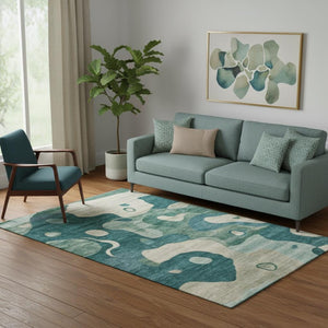 HomeRoots 8' Teal and Ivory Abstract Washable Round Rug - Stylish, Durable, UV Protected for Busy Homes! 716860