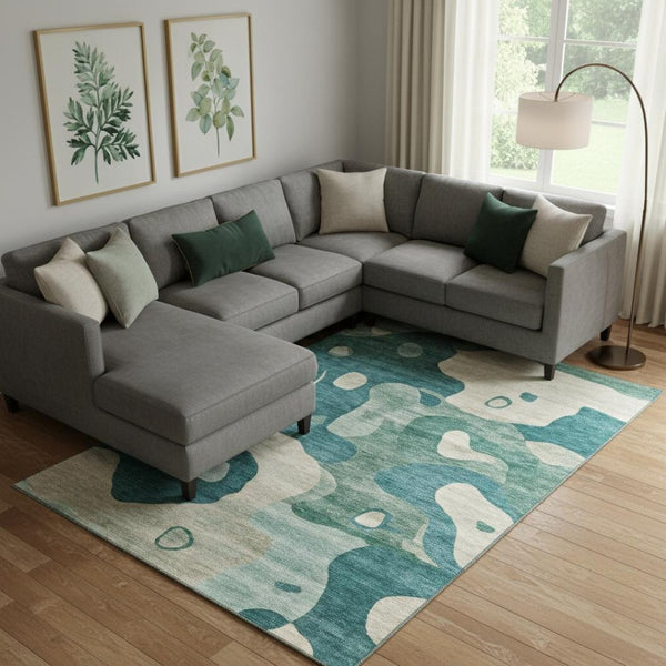 HomeRoots 9' X 12' Teal and Ivory Abstract Area Rug - Washable, UV Protected, Durable, Perfect for Families! 716862