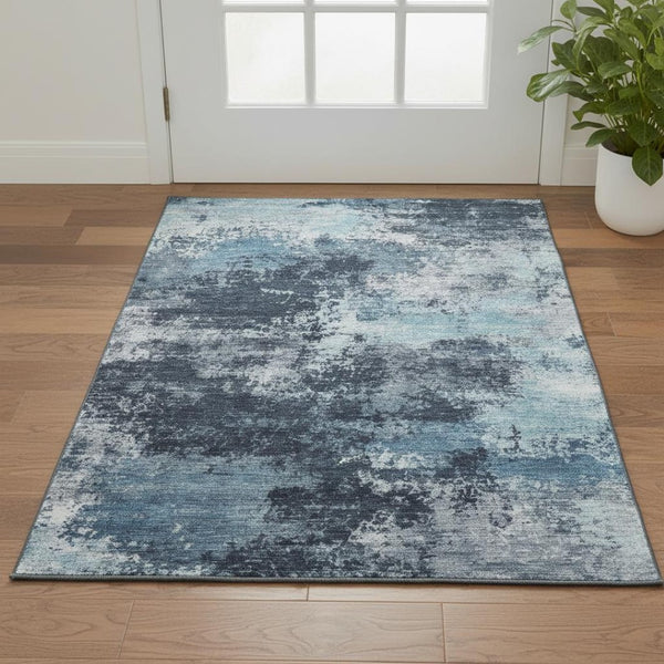HomeRoots 5' Blue and Ivory Abstract Washable Area Rug - Durable, Stylish, UV Protected for High-Traffic Rooms 716889