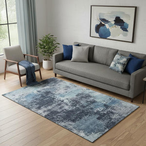 HomeRoots 8' Modern Blue and Ivory Abstract Round Rug - Washable, UV Protected, Durable for High-Traffic Areas 716890
