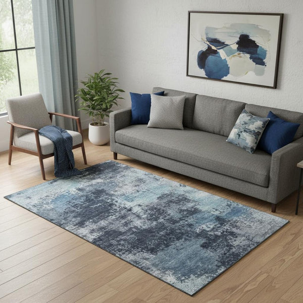 HomeRoots 8' Modern Blue and Ivory Abstract Round Rug - Washable, UV Protected, Durable for High-Traffic Areas 716890