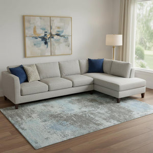 HomeRoots 10' X 14' Modern Abstract Area Rug in Taupe & Sky Blue - Washable, Durable, UV Protected Design 716917
