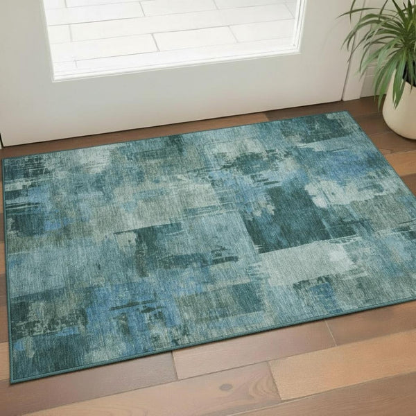 HomeRoots 5' X 8' Teal & Aqua Abstract Area Rug - Washable, UV-Protected, Durable, Ideal for High-Traffic Spaces 717052