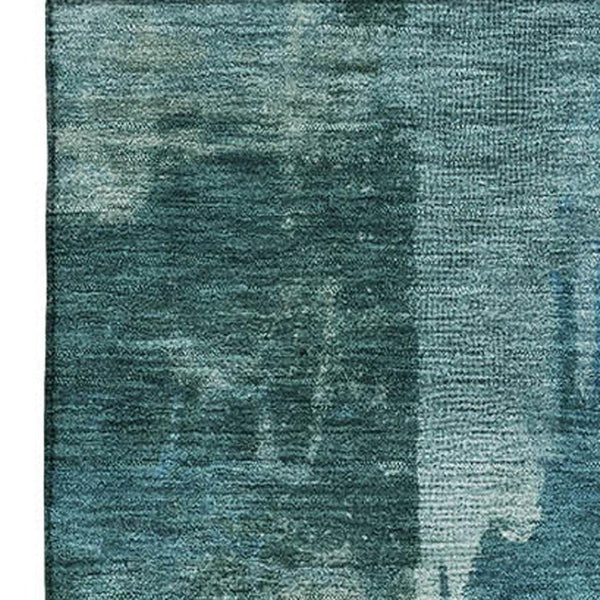 HomeRoots 9' X 12' Teal And Aqua Abstract Washable Area Rug - UV Protected, Stain-Resistant, Modern Design 717055