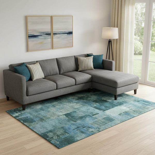 HomeRoots 10' X 14' Teal and Aqua Abstract Area Rug - Washable, UV Protected, Non-Slip for High-Traffic Homes 717056