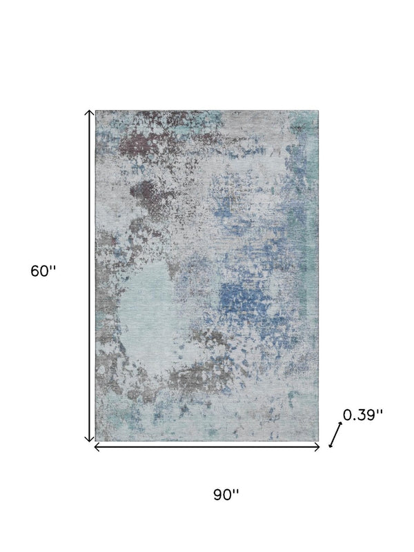 HomeRoots 8' Turquoise and Gray Abstract Washable Round Rug - UV Protected, Non-Slip, Perfect for High-Traffic Areas 717077