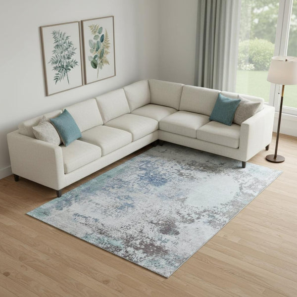 HomeRoots 9' X 12' Turquoise and Gray Abstract Area Rug - Washable, UV-Protected, Perfect for Busy Homes! 717079