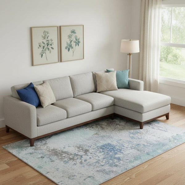 HomeRoots 10' Turquoise and Gray Abstract Area Rug - Washable, UV Protected, Durable for High-Traffic Spaces 717080