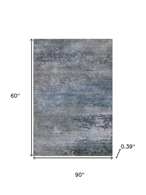 HomeRoots 8' Modern Pewter and Charcoal Abstract Round Rug - Washable, UV Protected, Non-Slip, Stain Resistant 717107