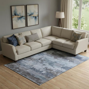 HomeRoots 9' X 12' Blue & Charcoal Abstract Washable Area Rug with Non-Slip Backing & UV Protection 717181