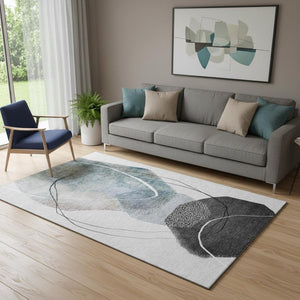 HomeRoots 8' Ivory and Gray Abstract Round Rug – Washable, UV-Protected, Non-Slip, Ideal for Modern Spaces! 717215
