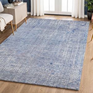 HomeRoots 8' Blue And Ivory Abstract Round Rug - Washable, UV-Protected, Stain-Resistant for Modern Spaces 717323