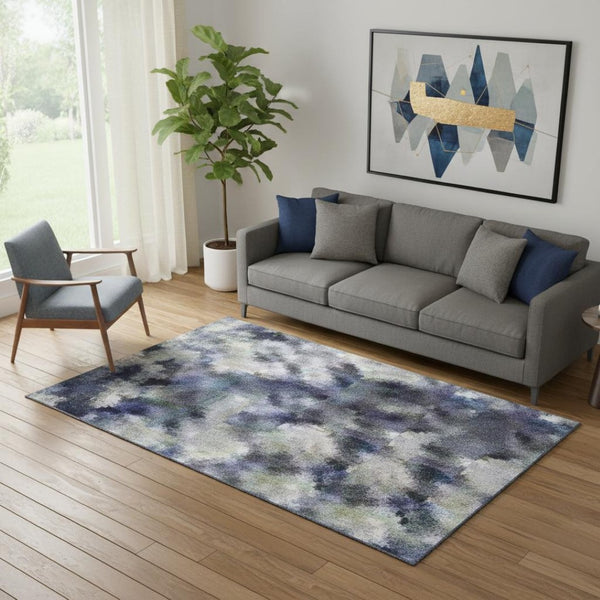 HomeRoots 8' Blue And Ivory Abstract Round Rug - Washable, UV-Protected, Stain-Resistant for Modern Spaces 717323