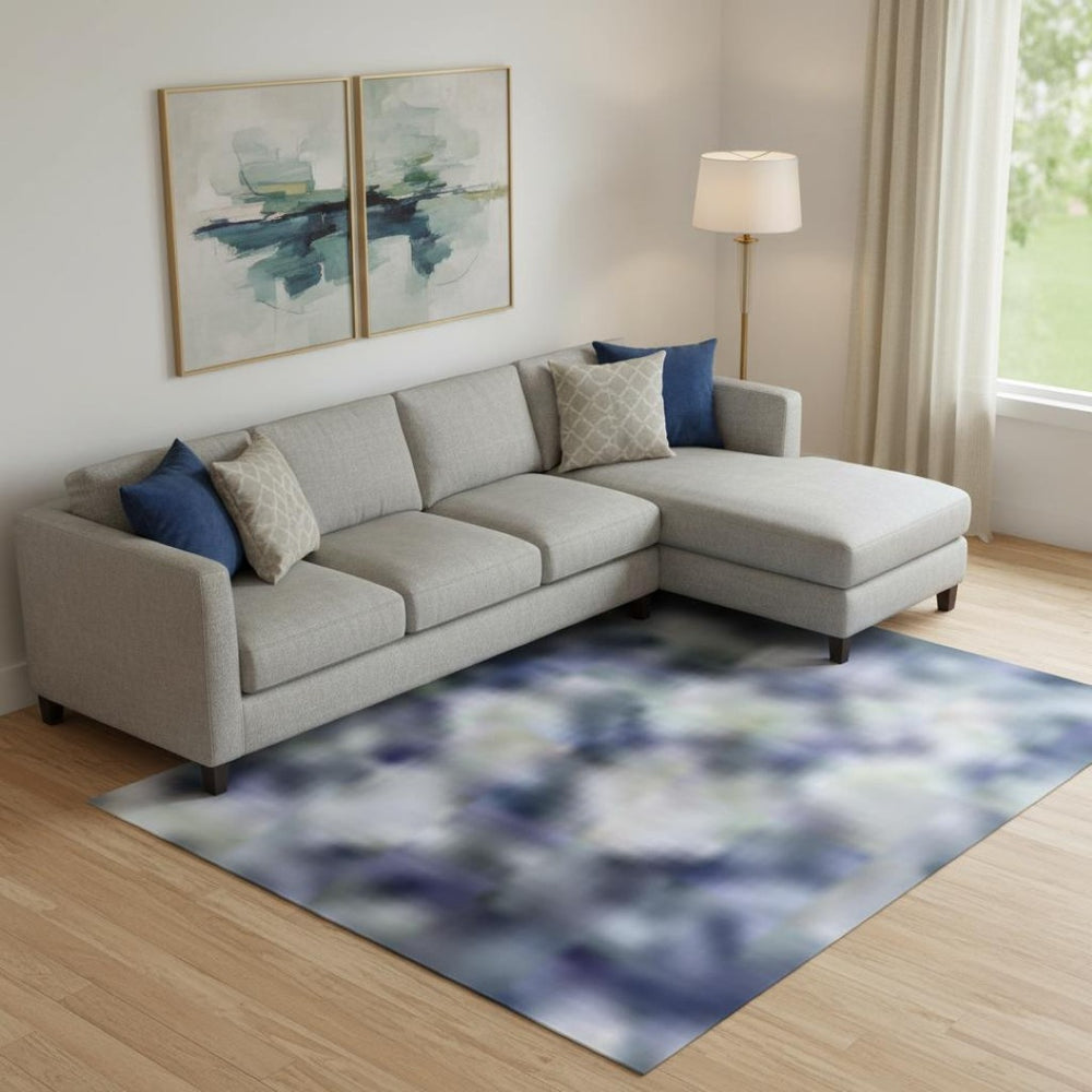HomeRoots 9' X 12' Blue And Ivory Abstract Washable Area Rug with UV Protection for Stylish, Easy Care Living 717325