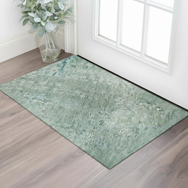 HomeRoots 5' X 8' Teal And Ivory Abstract Area Rug - Washable, UV-Protected, Durable Design for High-Traffic Spaces 717334