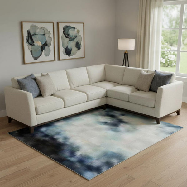 HomeRoots 9' X 12' Stylish Blue & Ivory Abstract Washable Area Rug with UV Protection for Active Homes 717541