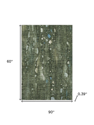 HomeRoots 8' Fern Green and Blue Abstract Washable Round Rug - UV Protected, Stain Resistant, Modern Design 717551