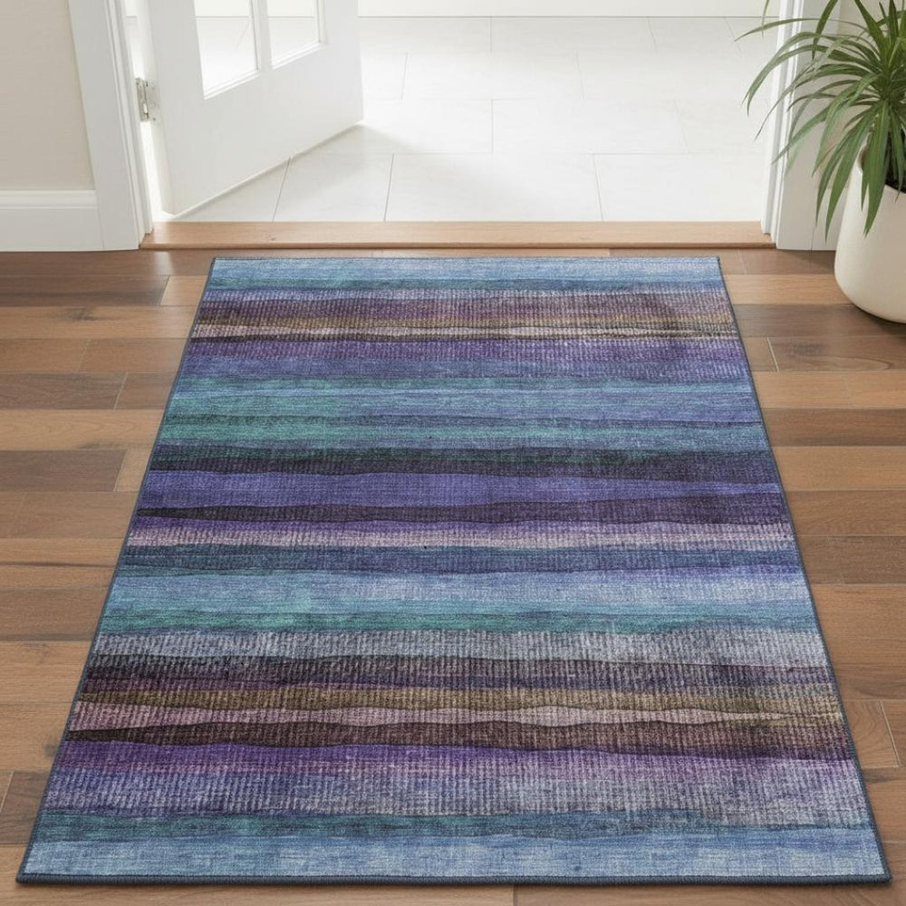 HomeRoots 5' X 8' Vibrant Blue and Purple Striped Washable Area Rug with UV Protection for Indoor & Outdoor Use 717580