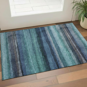 HomeRoots 5' X 8' Striped Teal & Navy Area Rug - Washable, UV Protected, Stylish & Durable for Active Homes 717598