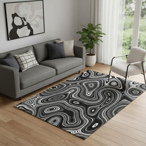 HomeRoots 8' Black and Ivory Geometric Round Rug - Washable, UV Protected, Durable Polyester for Modern Spaces 717708