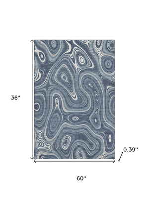 HomeRoots 5' X 8' Blue and Ivory Geometric Washable Area Rug with UV Protection for Family-Friendly Spaces 717713