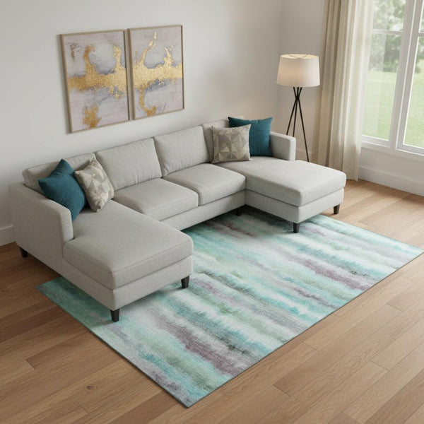 HomeRoots 9' X 12' Striped Teal and Ivory Washable Area Rug with UV Protection for Stylish Living Spaces 717754