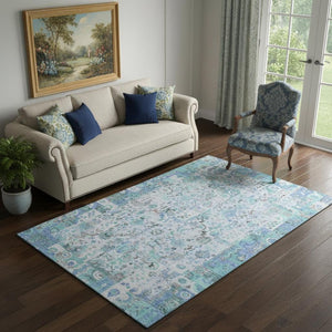 HomeRoots 8' Blue and Ivory Patchwork Washable Round Rug - UV Protected, Stain Resistant, Durable Design for Homes 717758