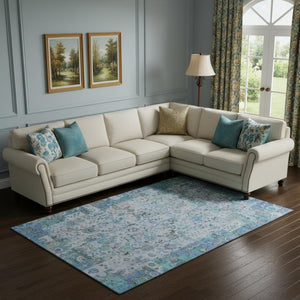 HomeRoots 9' X 12' Blue and Ivory Patchwork Area Rug - Durable, Washable, UV-Protected for Homes & Outdoors 717760