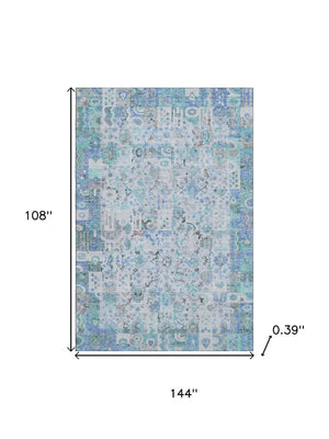 HomeRoots 10' X 14' Blue and Ivory Patchwork Rug – Washable, UV-Protected, Non-Slip, Stain-Resistant Design 717761