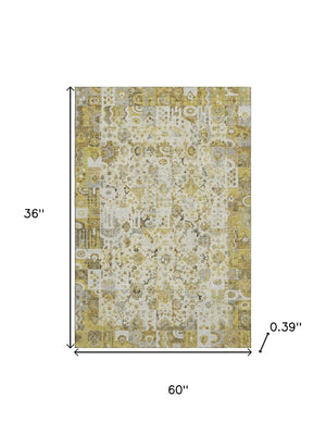 HomeRoots 5' X 8' Gold And Ivory Patchwork Area Rug - Stain Resistant, Machine Washable, UV Protected & Durable 717763