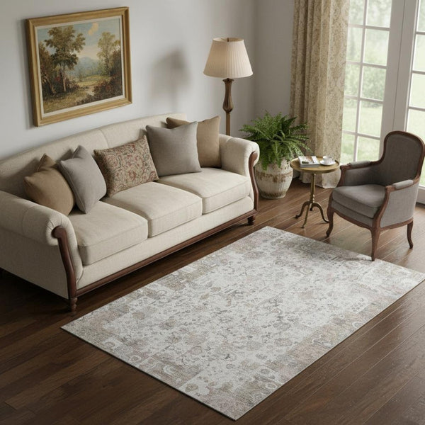 HomeRoots 8' Taupe and Ivory Patchwork Washable Round Rug with UV Protection for Durable Everyday Use 717776